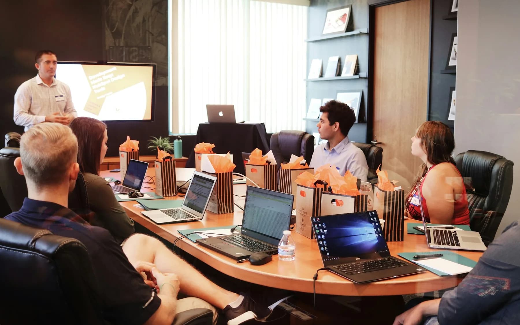 Professionals collaborating on management-system documents
